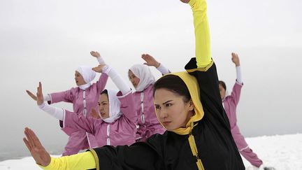 s’entraînent pout participer aux prochaines compétitions olympiques en Chine. Dans une épreuve organisée par le comité olympique à Kaboul, elle a remporté la première place. (Massoud Hossaini/Reuters)