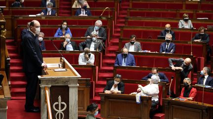 Le Premier ministre Jean Castex dans l'hémicycle de l'Assemblée nationale à Paris le 1er avril 2021 (THOMAS COEX / AFP)