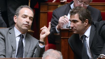 Jean-Fran&ccedil;ois Cop&eacute; et Christian Jacob discutent, le 4 d&eacute;cembre 2012, &agrave; l'Assembl&eacute;e nationale, &agrave; Paris. (BERTRAND GUAY / AFP)