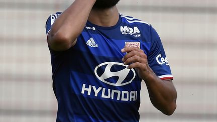 Nabil Fékir doit repasser sur le billard (PHILIPPE DESMAZES / AFP)