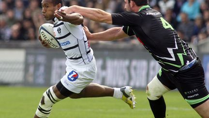 Damien Fèvre, ici au plaquage lors de la finale de ProD2 en 2012-2013 (DIARMID COURREGES / AFP)