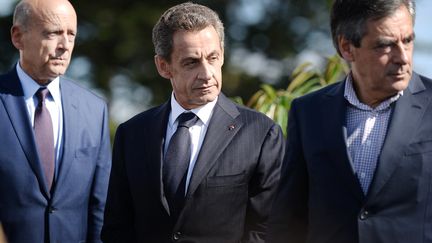 Trois futurs candidats à la primaire de droite de 2016, Alain Juppé, Nicolas Sarkozy et François Fillon, à l'université d'été des Républicains, à La Baule (Loire-Atlantique), le 5 septembre 2015. (JEAN-SEBASTIEN EVRARD / AFP)