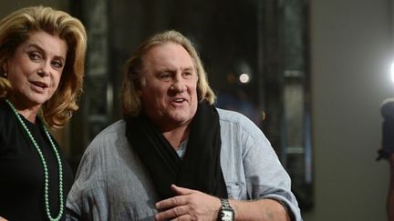 Gérard Depardieu et Catherine Deneuve lors de la sortie du dernier Axtérix "Au service de Sa Majesté", le 1er octobre 2012 à Berlin.
 (JOHANNES EISELE / AFP)