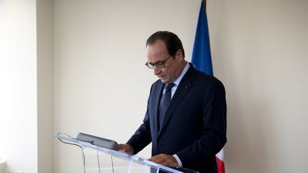 Le pr&eacute;sident Fran&ccedil;ois Hollande s'adresse &agrave; la presse, le 24 septembre 2014, &agrave; New York,&nbsp;apr&egrave;s la d&eacute;capitation du Fran&ccedil;ais Herv&eacute; Gourdel&nbsp;en Alg&eacute;rie. (ALAIN JOCARD / AFP)