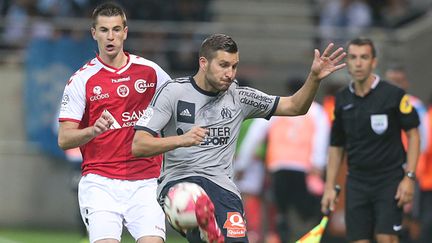 André-Pierre Gignac face à la défense rémoise (FRANCOIS NASCIMBENI / AFP)