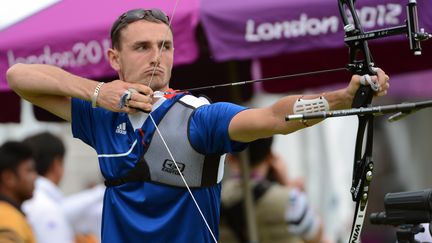 L'archer fran&ccedil;ais Romain Girouille et ses co&eacute;quipiers ont &eacute;chou&eacute; face au Mexique en quart de finale. (TOSHIFUMI KITAMURA / AFP)