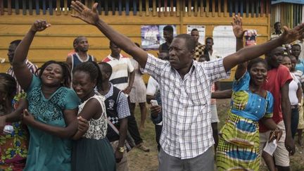 Des partisans de Nana Akufo-Addo, candidat du NPP, lors des élections présidentielles, à Kibi, le 7 décembre 2016. (CRISTINA ALDEHUELA / AFP)