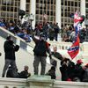 Des supporters de Donald Trump pénètrent dans l'enceinte du Capitole, mercredi 6 janvier 2021, à Washington (Etats-Unis).&nbsp; (TASOS KATOPODIS / GETTY IMAGES NORTH AMERICA / AFP)