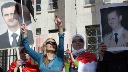 Manifestation pro-régime, ce dimanche 13 novembre, à Damas. (LOUAI BESHARA / AFP)