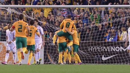 La joie des joueurs Australiens (PAUL CROCK / AFP)