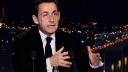 Nicolas Sarkozy annonce sa candidature à un second mandat, au 20 heures de TF1, le 15 février 2012. (AFP - Lionel Bonaventure)