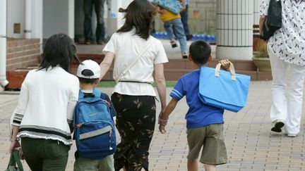 Au Japon, face à la pauvreté, les femmes et les enfants sont les plus vulnérables. (STR / JIJI PRESS / AFP)