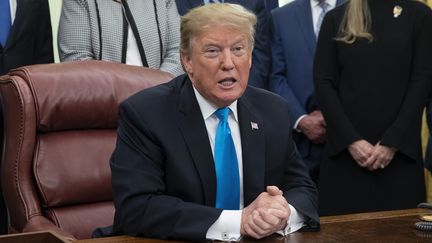 Le président américain Donald Trump, le 19 février 2019, dans le Bureau ovale de la Maison Blanche à Washington (Etats-Unis). (ALEX EDELMAN / CONSOLIDATED NEWS PHOTOS / AFP)