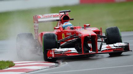 Fernando Alonso sur sa Ferrari (EMMANUEL DUNAND / AFP)