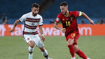 Eden Hazard et les Belges ont passé l'obstacle portugais, dimanche 27 juin à Séville. (JULIO MUNOZ / POOL / AFP)