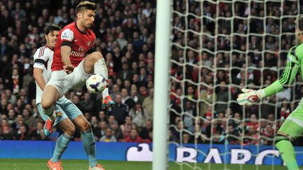 Olivier Giroud devant le but (GLYN KIRK / AFP)