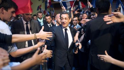 Nicolas Sarkozy, &agrave; son arriv&eacute;e pour un meeting au Raincy (Seine-Saint-Denis), le 26 avril 2012. (LIONEL BONAVENTURE / AFP)