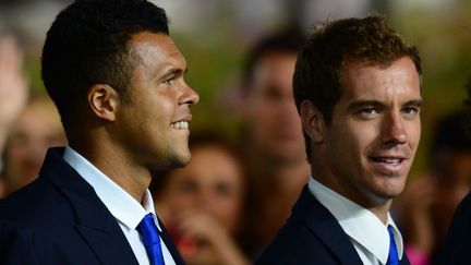 Les tennismen fran&ccedil;ais Jo-Wilfried Tsonga et Richard Gasquet s'en mordent les l&egrave;vres. (OLIVIER MORIN / AFP)