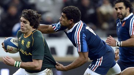 Jaque Fourie (Afrique du Sud) échappe à Wesley Fofana (France)