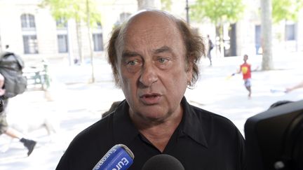 Alalin Pojolat, membre du NPA, photographi&eacute; ici le 26 juillet &agrave; Paris, quelques heures avant la manifestation pro-palestienne interdite, qui allait d&eacute;g&eacute;n&eacute;rer,&nbsp;place de la R&eacute;publique. (PIERRE ANDRIEU / AFP)