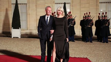 Le ministre de la Transition écologique, François de Rugy, et son épouse&nbsp;Séverine Servat-de Rugy, le 19 mars 2018 à l'Elysée. (LUDOVIC MARIN / AFP)