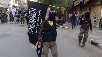 Un combattant du Front Al-Nosra, groupe rebelle syrien affili&eacute; &agrave; Al-Qa&iuml;da, le 28 juillet 2014 &agrave; Damas (Syrie). (RAMI AL-SAYED / AFP)