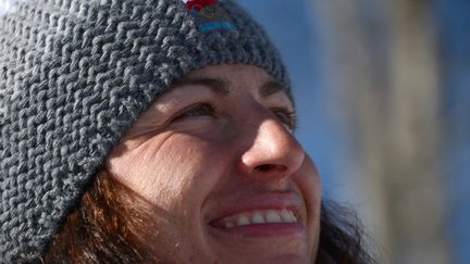 Justyna Kowalczyk au sommet du podium à Sotchi (KIRILL KUDRYAVTSEV / AFP)