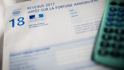 Une feuille de déclaration d'impôt sur la fortune immobilière.&nbsp; (ALEXIS SCIARD  / MAXPPP)