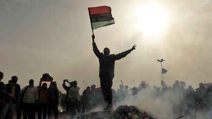 Un opposant au régime libyen, à Benghazi, en mars 2011 (AFP - Roberto Schmodt)