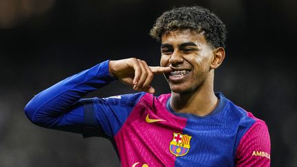 Le prodige espagnol du Barça, Lamine Yamal, célèbre son but lors du Clasico face au Real Madrid, à l'occasion de la 11e journée de la Liga, le 26 octobre 2024. (OSCAR BARROSO / AFP)