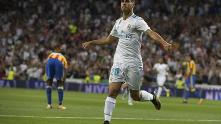 Auteur d'un doublé, Marco Asensio a offert le point du nul au Réal.  (CURTO DE LA TORRE / AFP)