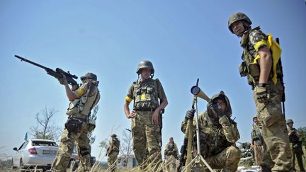 &nbsp; (Des soldats ukrainiens dans la région du Donbass, dans l'Est de l'Ukraine, le 8 août © MaxPPP)