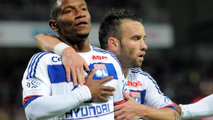 Claudio Beauvue, ici avec Mathieu Valbuena  (FRED TANNEAU / AFP)