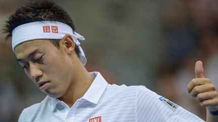 Kei Nishikori a pris ce lundi la 7e place du classement ATP (MOHD RASFAN / AFP)