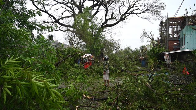 Wind-blown trees litter the streets, after Cyclone Mocha hit Kyauktaw, Burma, on May 14, 2023. (SAI AUNG MAIN / AFP)