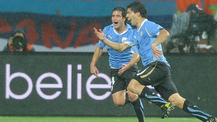 La joie du buteur uruguayen Luis Suarez (JUNG YEON-JE / AFP)