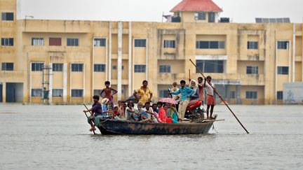 Les inondations s'étendent en Asie