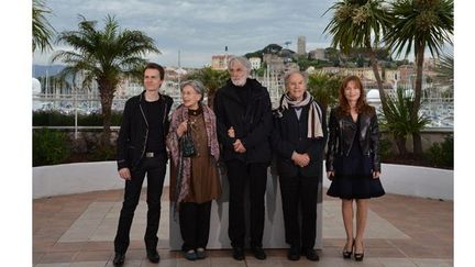 L&#039;équipe du film lors de la séance photo du 20 mai à Cannes
 (AFP PHOTO / ALBERTO PIZZOLI)