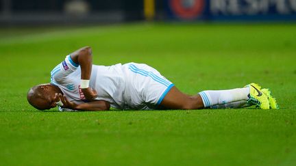 L'attaquant de l'OM Andr&eacute; Ayew au sol, lors du match perdu 3-0 par son &eacute;quipe face au Borussia Dortmund, le 1er octobre 2013 &agrave; Dortmund (Allemagne).&nbsp; (DENIS GROMBKOWSKI / BONGARTS / GETTY IMAGES)