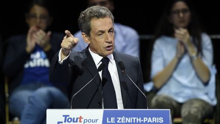 Nicolas Sarkozy prononce un discours, lors du meeting au zénith de Paris, dimanche 9 octobre 2016.&nbsp; (MIGUEL MEDINA / AFP)