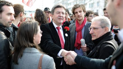 Jean-Luc Mélenchon aux côtés d'André Kotarac, le 14 mars 2014, pendant la campagne des municipales à Lyon. (MAXPPP)