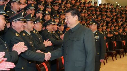 Le président chinois Xi Jinping, chef des armées, entend accroître son autorité sur l'Armée populaire de Libération (APL). (LI GANG / XINHUA /AFP)