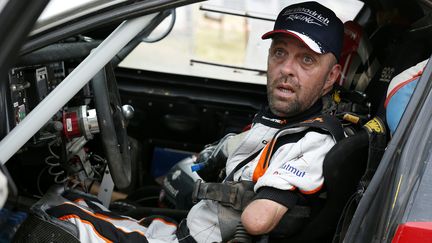 Le Français Philippe Croizon à la fin de la 12e étape du rallye Dakar 2017, à Buenos Aires en Argentine, le samedi 14 janvier 2017. (FRANCK FIFE / AFP)