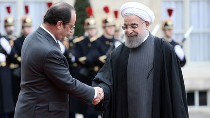 François Hollande reçoit le président iranien Hassan Rohani, à l'Elysée, le 28 janvier 2016. (STEPHANE DE SAKUTIN / AFP)