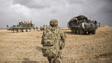 Des soldats am&eacute;ricains du 36e r&eacute;giment d'infanterie dans la province de Kandahar (Afghanistan), le 3 f&eacute;vrier 2013. (ANDREW BURTON / REUTERS)