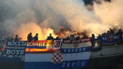 Des supporters de la Croatie dans les tribunes du stade Giuseppe Meazza de Milan, lors d'un match contre l'Italie, le 16 novembre 2014. (MASSIMO CEBRELLI / AFP)