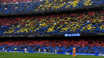 Les tribunes du Camp Nou remplies par plus de 90 000 personnes le 30 mars 2022 pour le match de Ligue des champions féminine entre le FC Barcelone et le Real Madrid. (ADRIA PUIG / ANADOLU AGENCY / AFP)