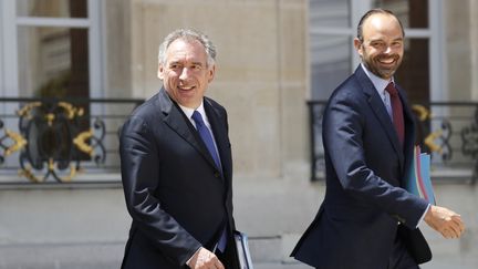 François Bayrou et Edouard Philippe à la sortie du conseil des ministres du mercredi 14 juin 2017. (PATRICK KOVARIK / AFP)