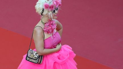 Du rose et des roses. Certains éblouissent par leur absence, d'autres aveuglent par leur présence.
 (Valery HACHE / AFP)