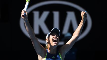 La joie de la Danoise et numéro deux mondiale, Caroline Wozniacki. (WILLIAM WEST / AFP)